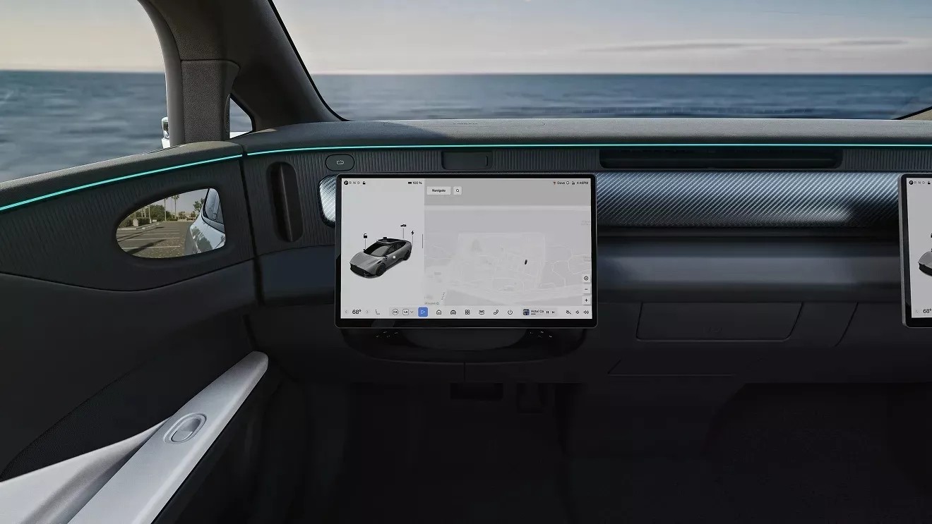 Công nghệ vô-lăng gập này sẽ xuất hiện trên xe tự lái Tensor Robocar do VinFast lắp ráp Khi vô lăng gập vào trong mặt táp-lô, một màn hình trung tâm sẽ trượt ra vị trí trước người lái