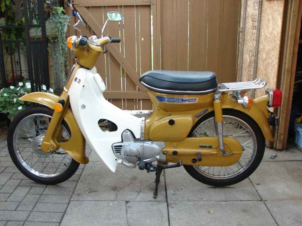 Khi nào Honda mới quyết định Hãy thử tưởng tượng một chiếc Honda Super Cub thập niên 1970 với mô-tơ điện mà xem
