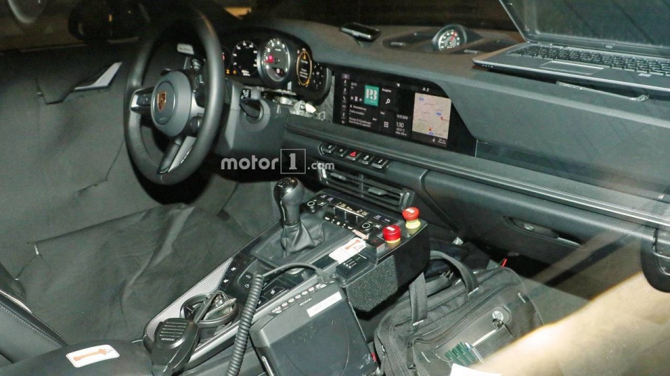 Porsche lần đầu "khoe" thế hệ 911 hoàn toàn mới porsche lan dau khoe the he 911 hoan toan moi