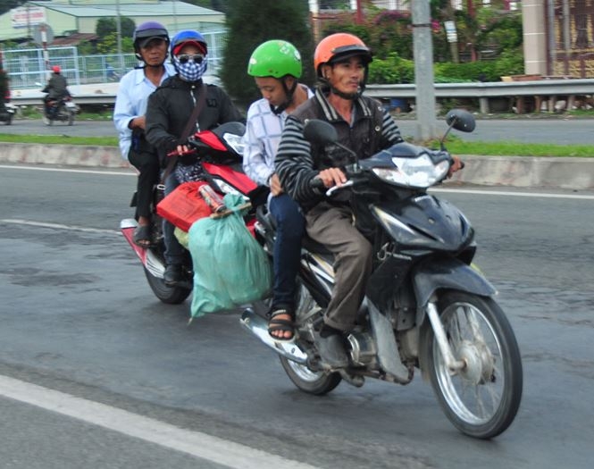 Người dân ùn ùn trở lại TP Hồ Chí Minh làm việc đầu năm mới nguoi dan un un tro lai tp ho chi minh lam viec dau nam moi