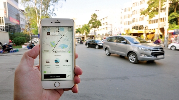 Có nên quy định giá trần, giá sàn cho Uber, Grab?