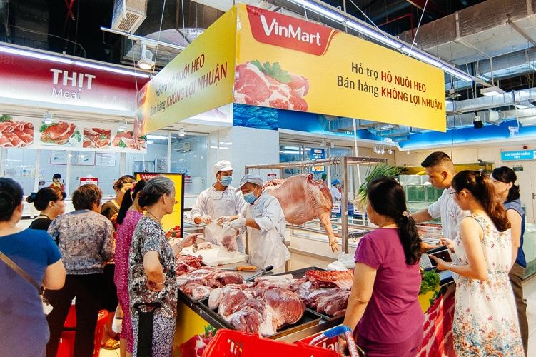 Vinmart "Hỗ trợ hộ nuôi heo - bán hàng không lợi nhuận" vinmart ho tro ho nuoi heo ban hang khong loi nhuan