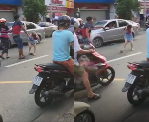 tam giu nam thanh nien dap mu bao hiem vao dau co gai sau va cham giao thong