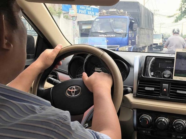 Không thể cấm dịch vụ đi chung xe của Uber, Grab khong the cam dich vu di chung xe cua uber grab