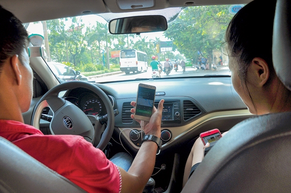Được gì sau 2 năm thí điểm Uber, Grab? duoc gi sau 2 nam thi diem uber grab