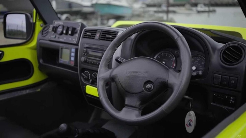 suzuki jimny luong cu leo nui sieu boi loi gioi gia chi 283 trieu