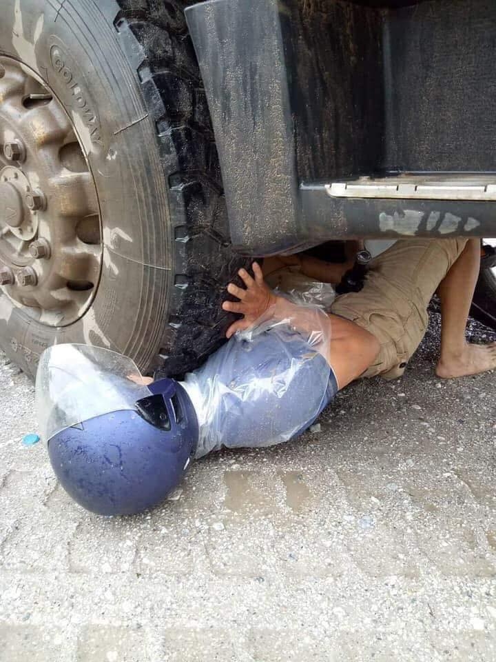 nguoi dan ong thoat chet ngoan muc ngay duoi banh xe tai tai quoc lo 70